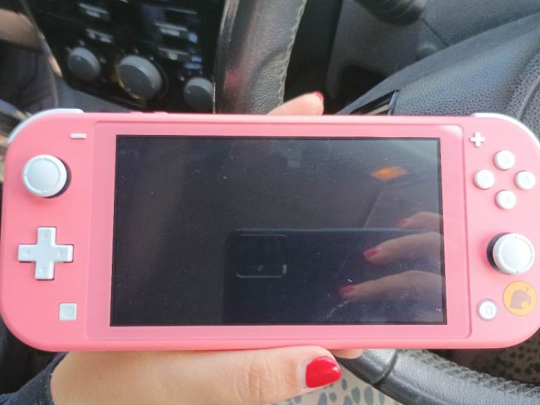 Nintendo Switch Lite (Pink) like new 
