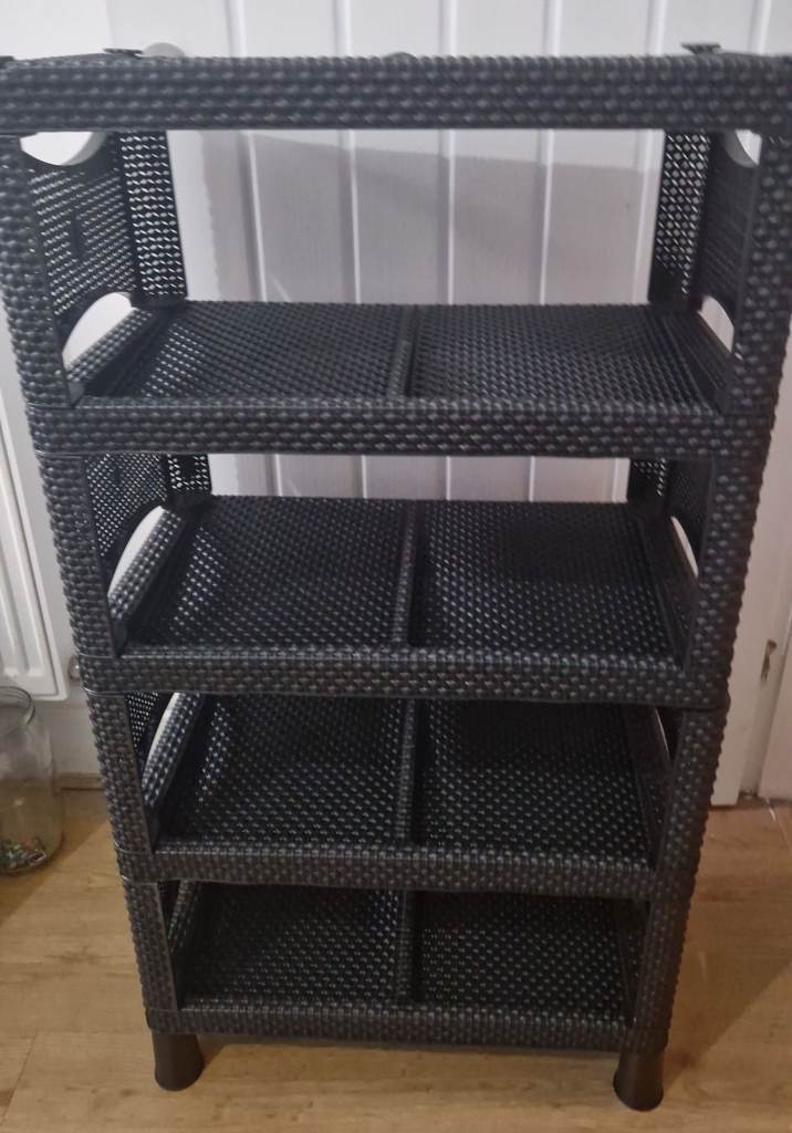 Black plastic shoe rack