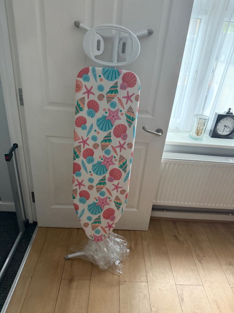 Nearly New Ironing Board with Seashell Cover and Wall Mount