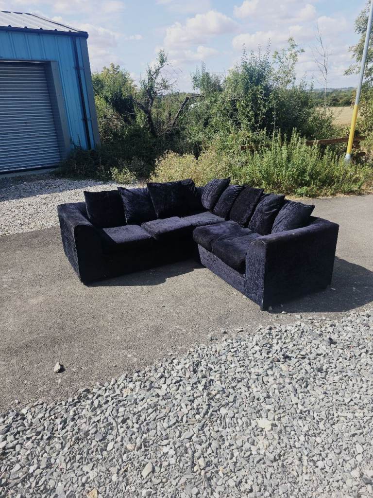 Black Corner Sofa with Cushions – Good Condition