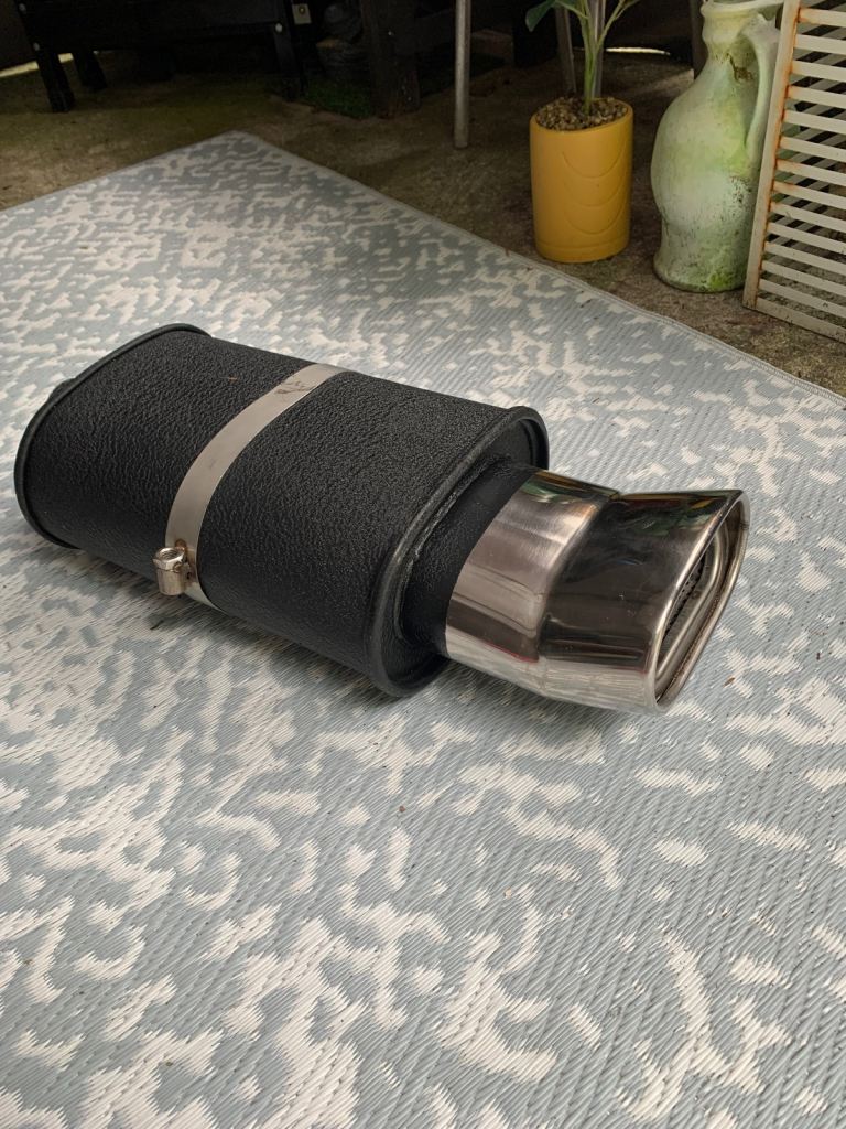 Sports car exhaust silencer 