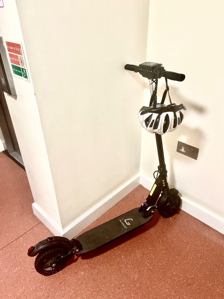 image for Foldable fast and light e-scooter, like new, KUGOO S1(S3) helmet, charger and case included