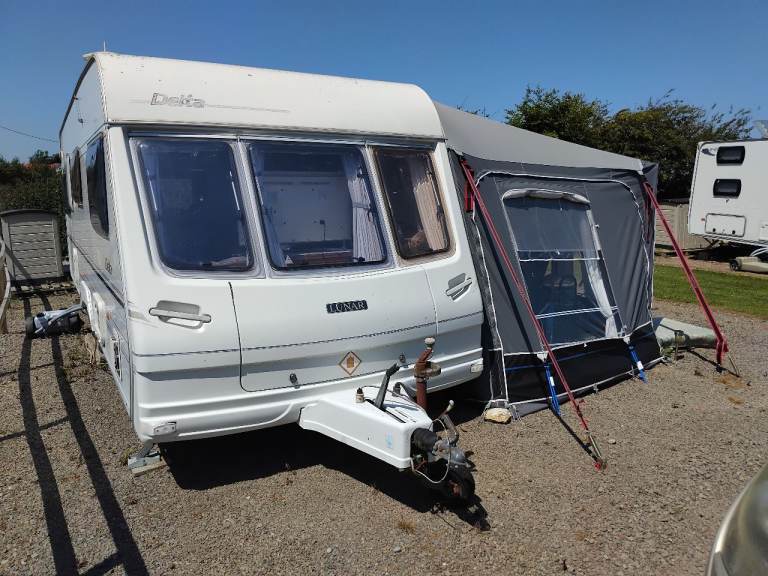 4 berth caravan with awning,shed,flooring 