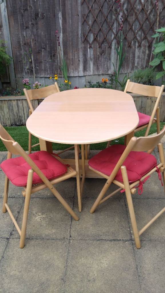 Wooden Extendable Dining Table with 4 Folding Chairs and Cushions