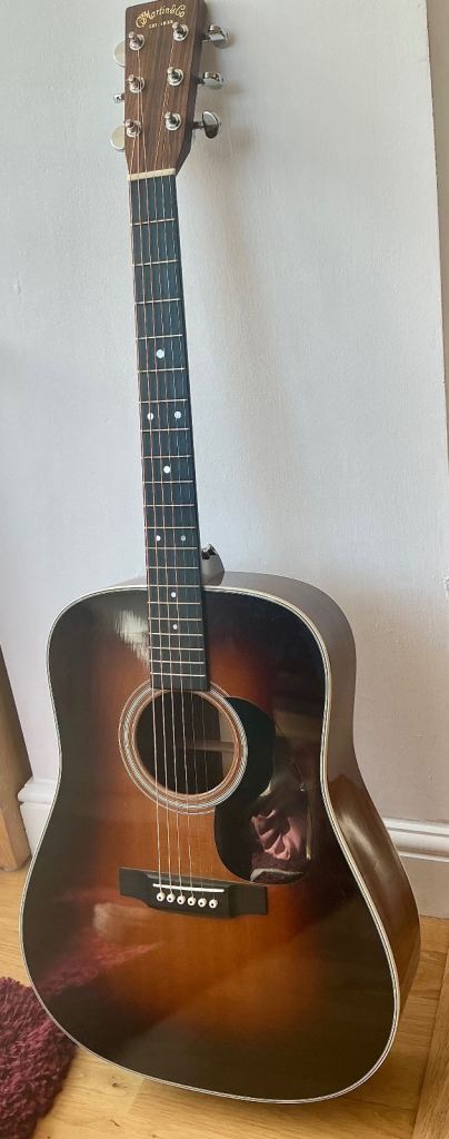 Martin d28 acoustic guitar with 1935 sunburst