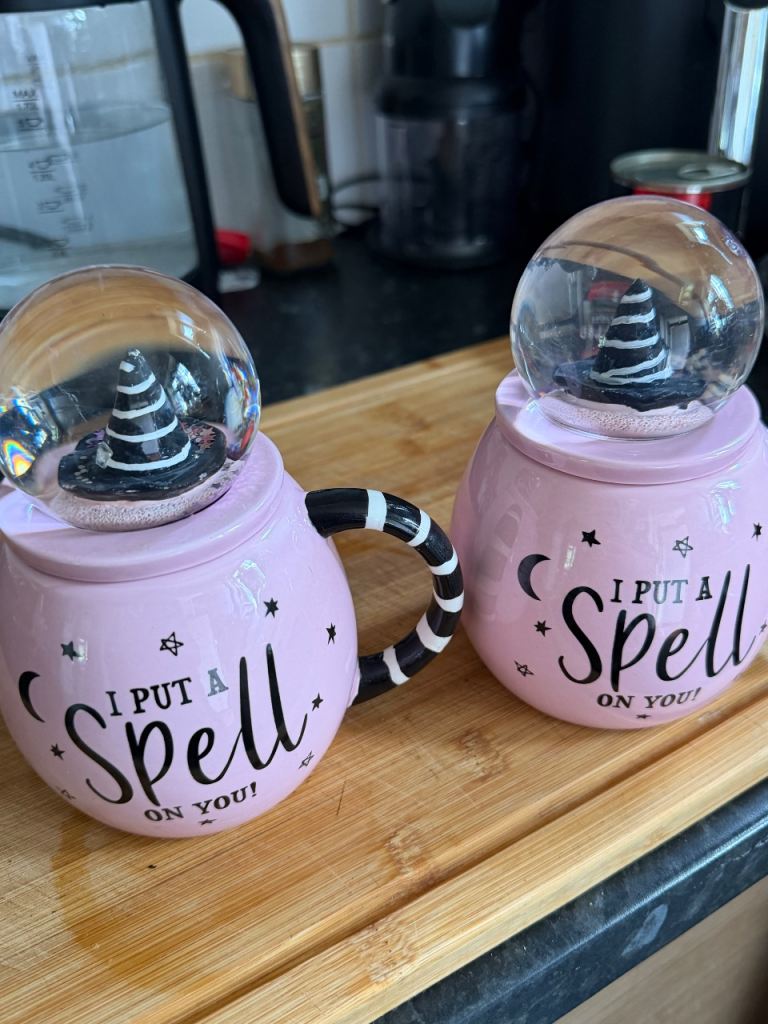 Two pink witchy mugs 