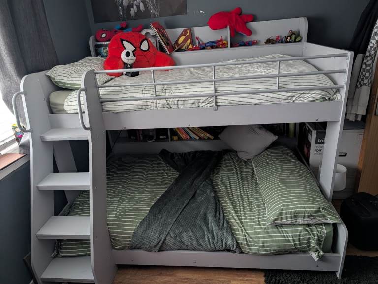 Abby bunk bed with storage comes with mattresses.