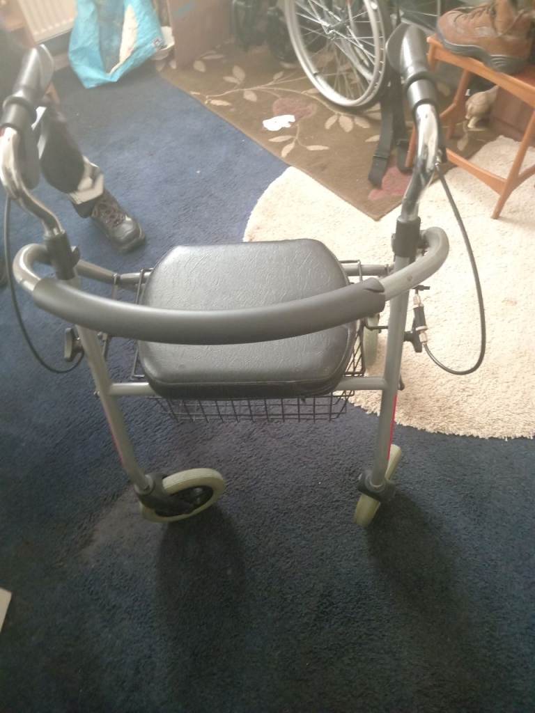 Rollator and seat
