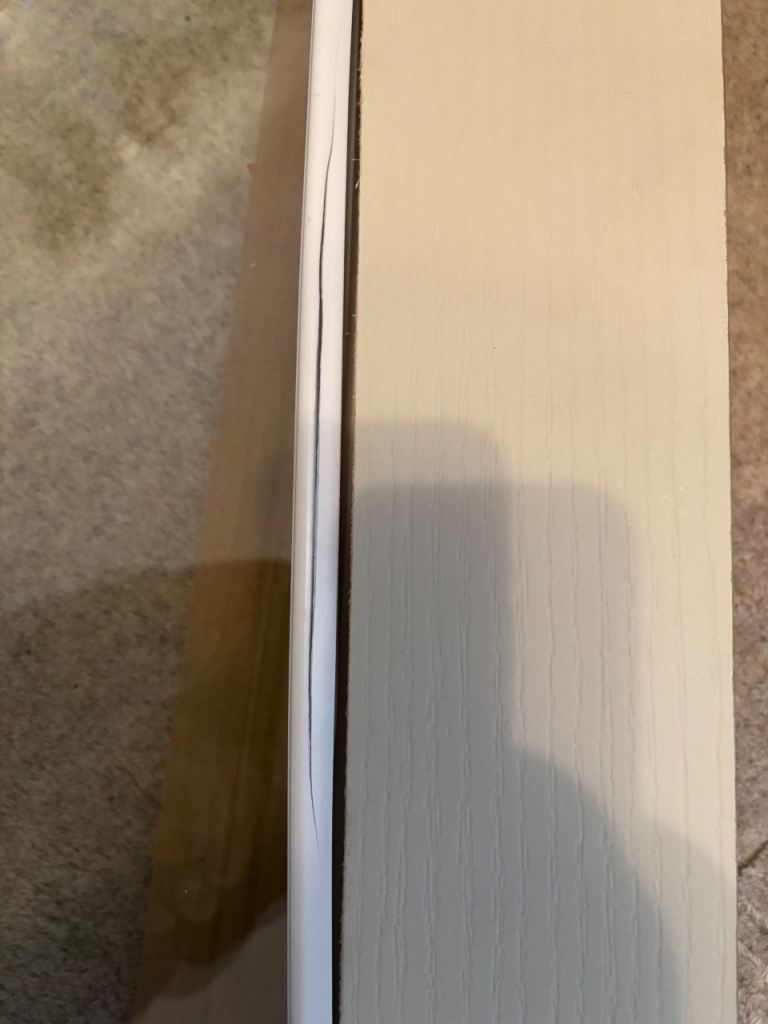 Unused White bi-fold half glazed door. (1 Trim damaged ) 