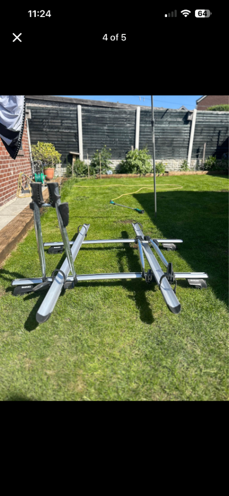 Suzuki roof bars and Halfords bike carrier 