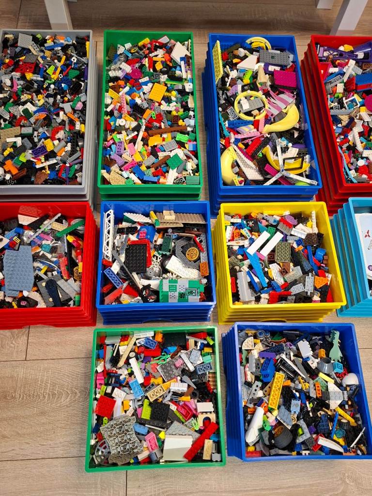 23kg assorted lego storage boxes and table, books.