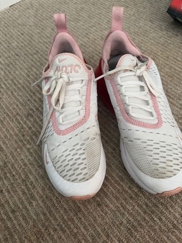 Pink and white Nike trainers 