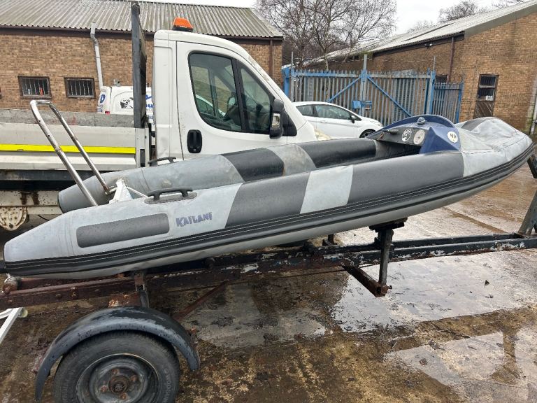 Boat rib and yard trailer 