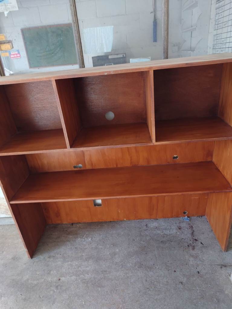 Wooden fixed shelf unit