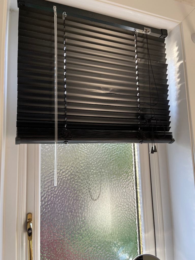 Small black Venetian blind