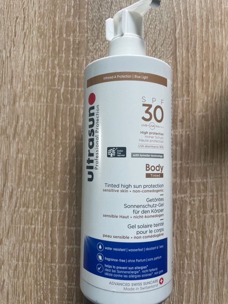 New tinted ultra sun high sun protection S P F 30 