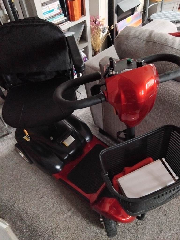 Red Mobility boot scooter.