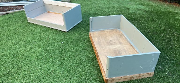 2 wooden dog beds