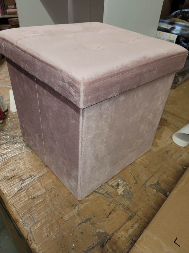 A new pink velvet effect finish ottoman box .