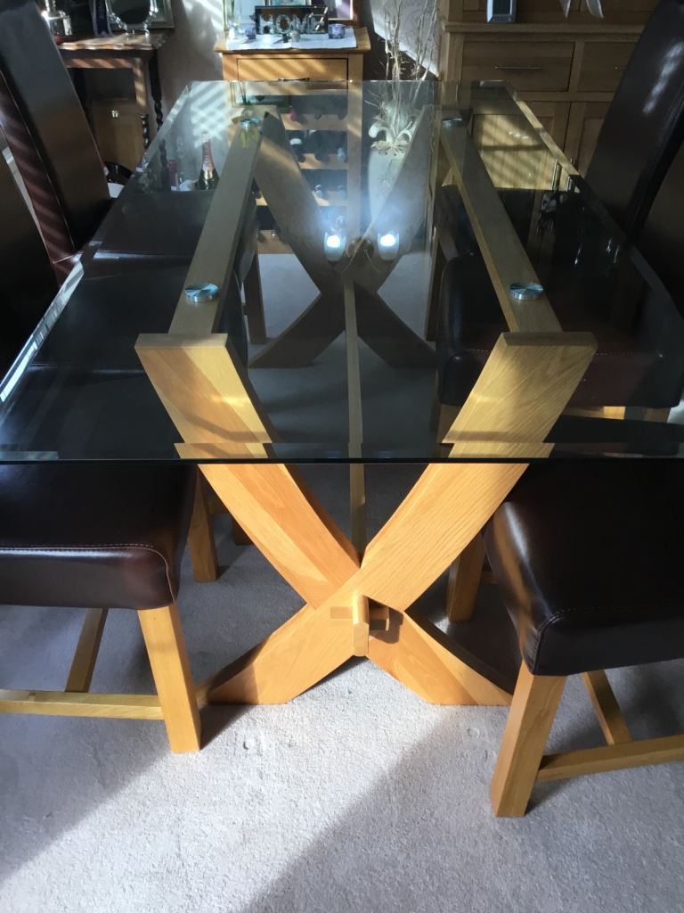 Reflection Glass Dining table with 4 Leather chairs