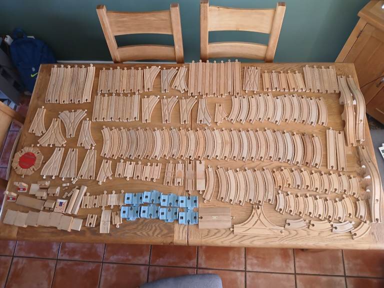 Massive lot of wooden train track and pieces 