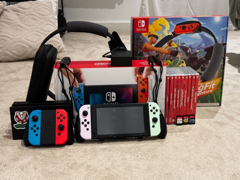 Nintendo Switch with Games and Accessories – As Good As New