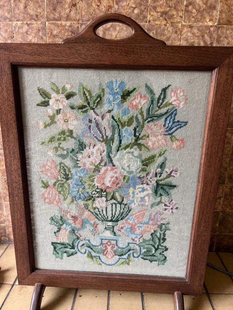 Antique oak-framed fire screen featuring a hand-stitched tapestry panel with a floral bouquet design