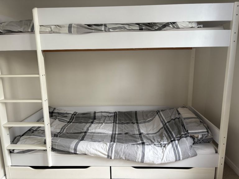 Solid wooden bunk beds with mattresses 