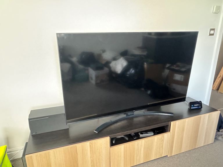 LG 55” 4K Smart TV with stand and remote 