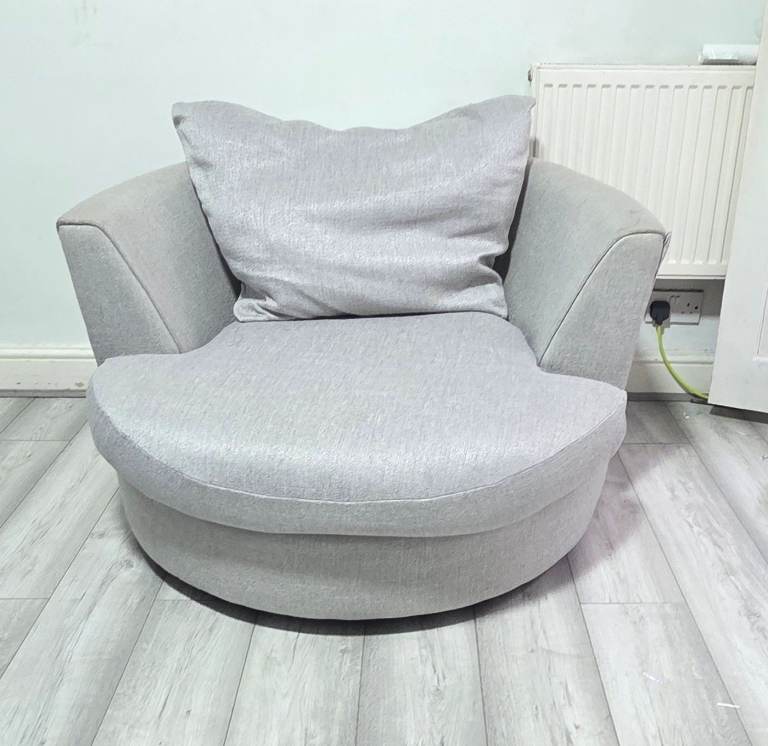 Large Grey upholstered spinning chair