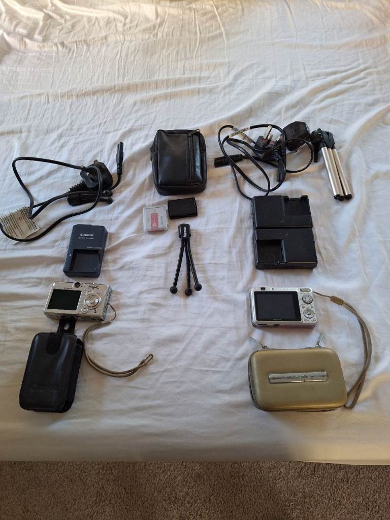 DIGITAL CAMERAS.  SONY DSC W120 AND CANON IXUS 50