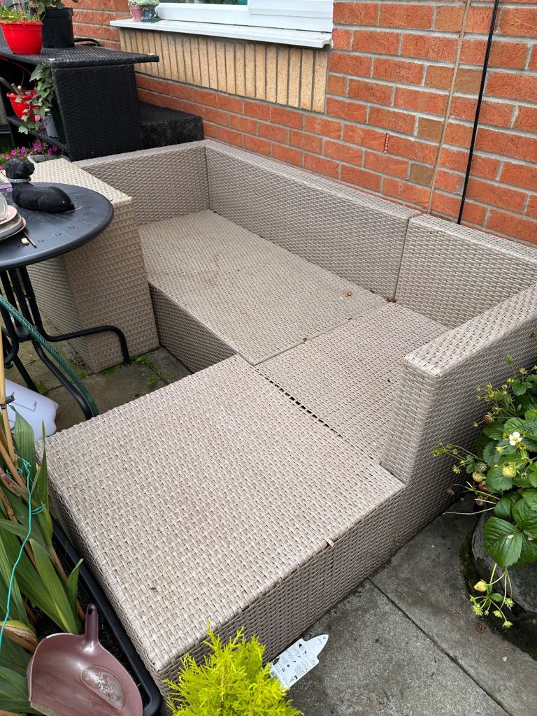 Free well used rattan sofa with footrest 