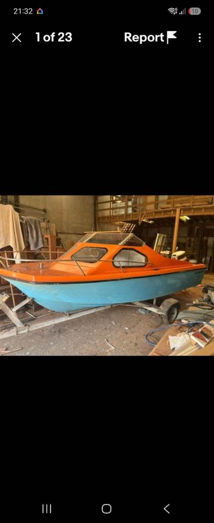 Small Fishing Boat with Trailer - Ready for Water
