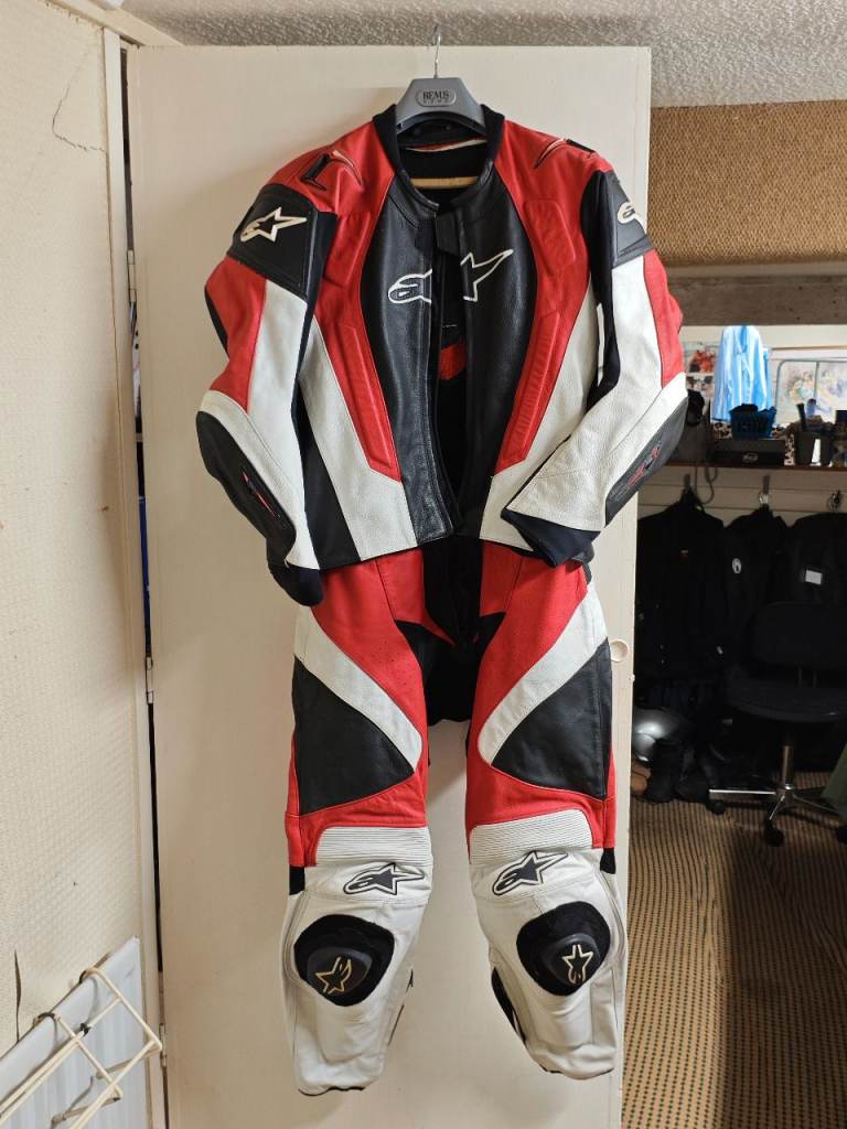 Alpinestars 2 piece leather motorcycle jacket and trousers - red, white, black