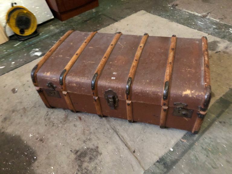 Lovely vintage cabin/steamer trunk- coffee table.