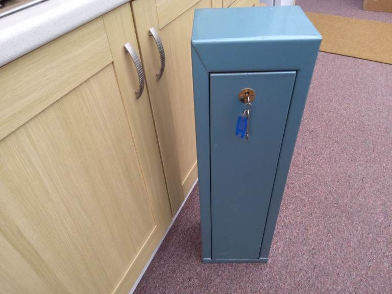 Gun cabinet with 2 keys