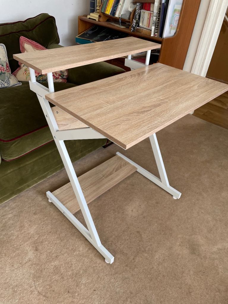 Modern well constructed split level wooden computer desk