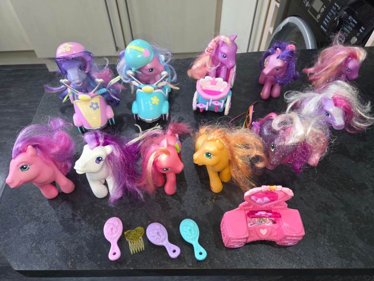11 My Little Pony Figures, 2 Scooters, 1 Carriage and Dressing Table