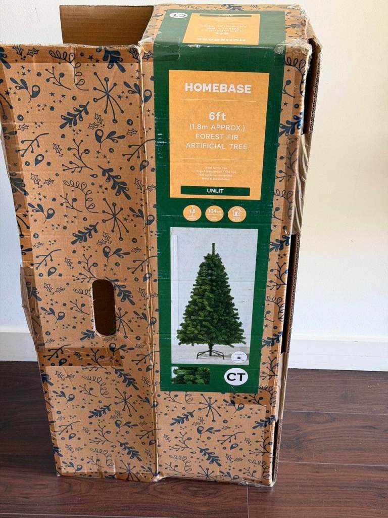 6ft Artificial Christmas Tree + Lights + Decorations (if needed)