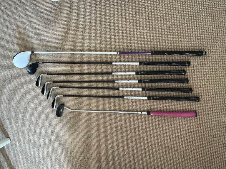 Golf clubs, bag and trolley