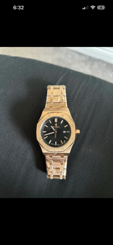 Men’s gold poedgar watch 