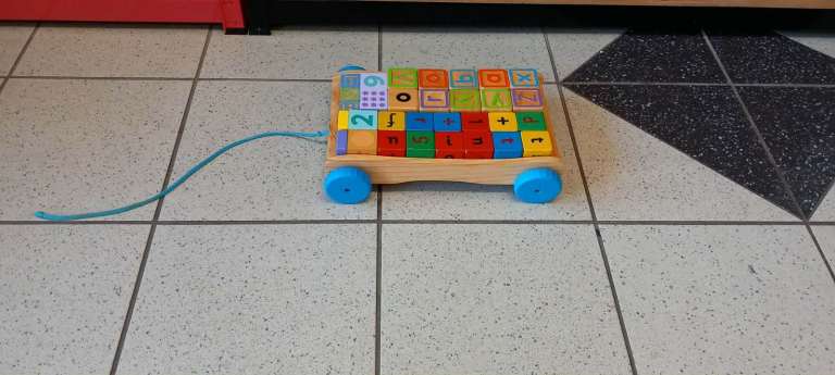 Pull along block cart with blocks