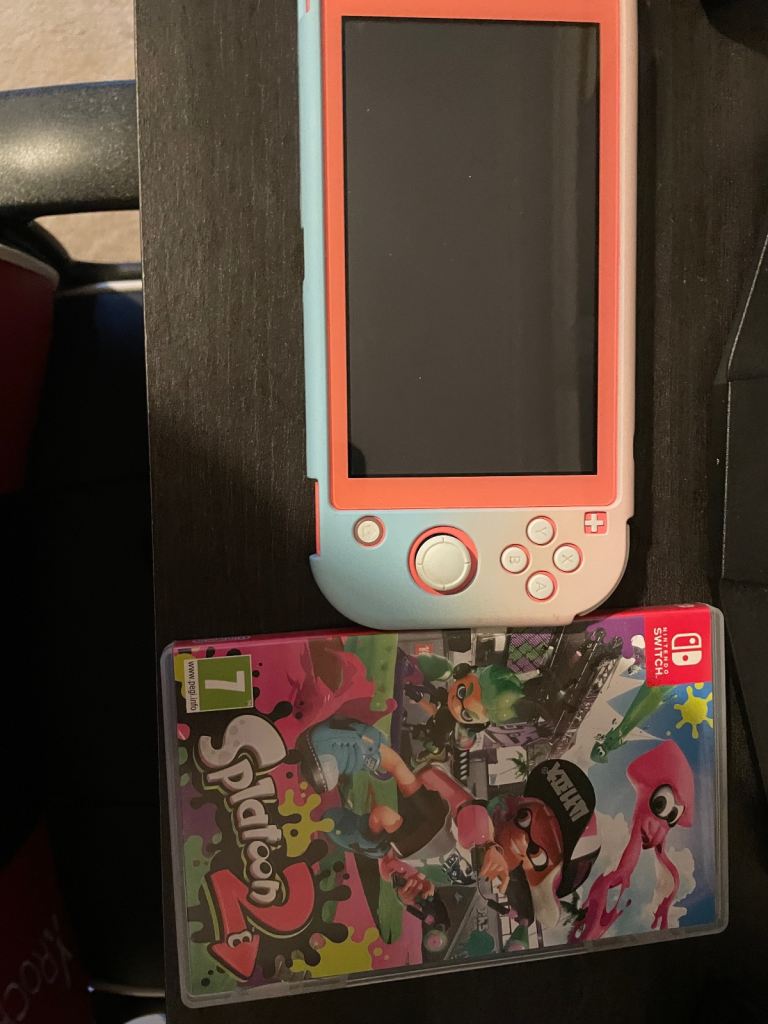 Pink Nintendo switch lite + Splatoon 2