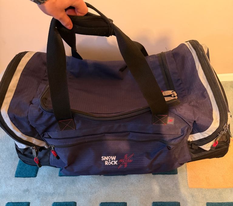 Snow + Rock extra large duffel ski bag luggage with wheels in navy 