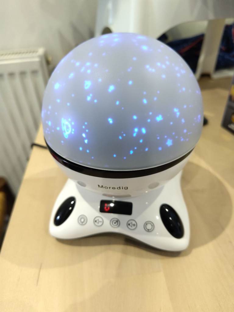 Space theme led rotating night light with music