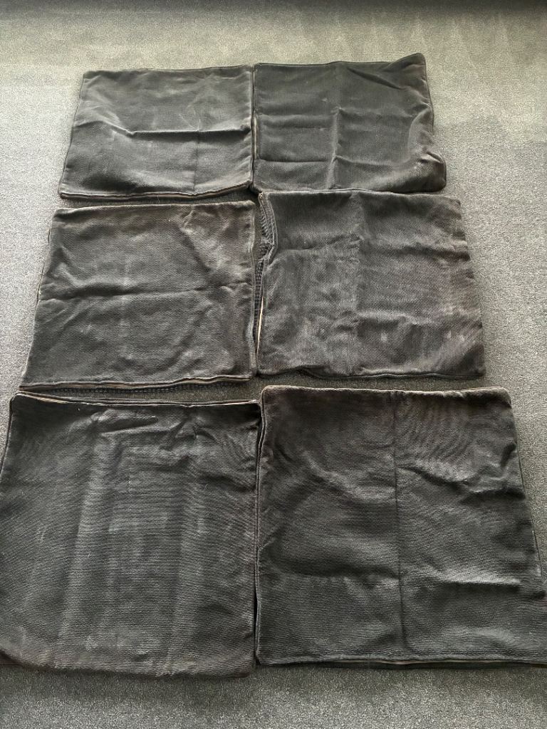 6 sofa cushion covers, approximately 62 x62 cm in size. 