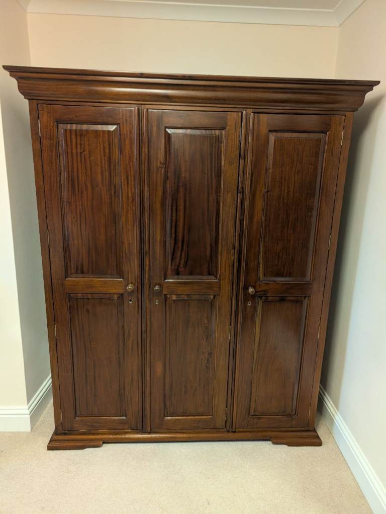 Solid mahogany wardrobe lock on one door needs attention 