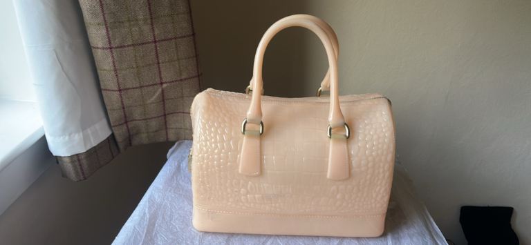 A furla candy bag unicorn pic means its still available 🦄 no matter how old ad is