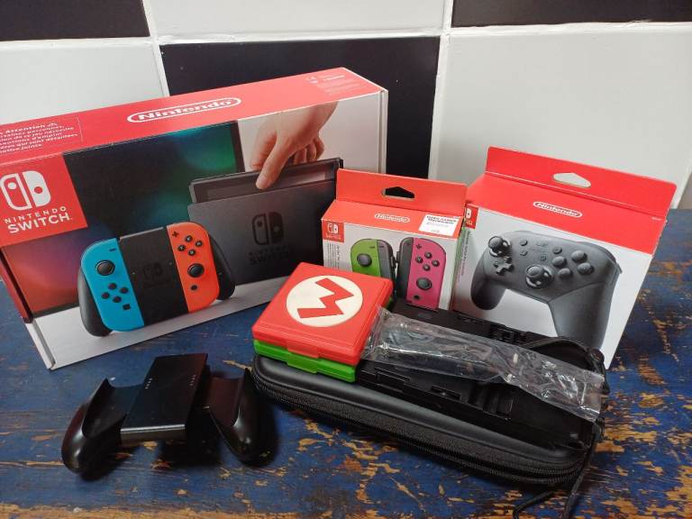 Nintendo Switch Console Bundle with Extra Joy-Cons and Pro Controller