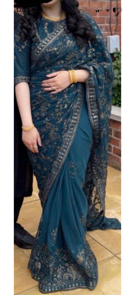 Lovely Teal Saree with Intricate Gold Embroidery